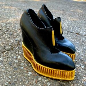 Designer leather boot / heels black and gold